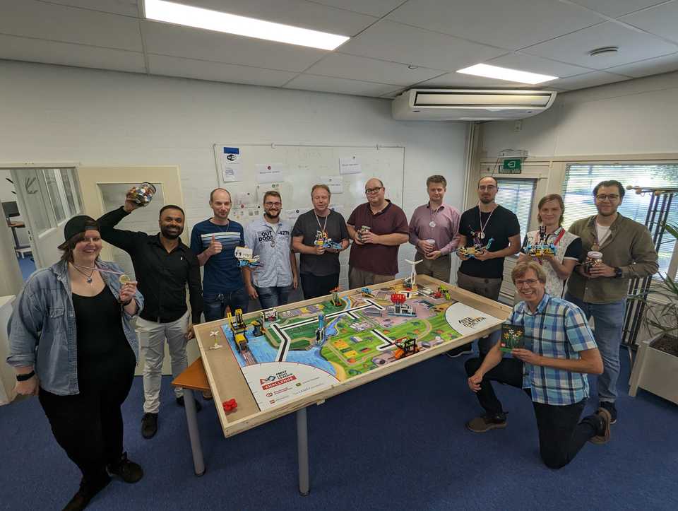 a group picture of all the contestants, some wearing their medals and carrying their candy prize